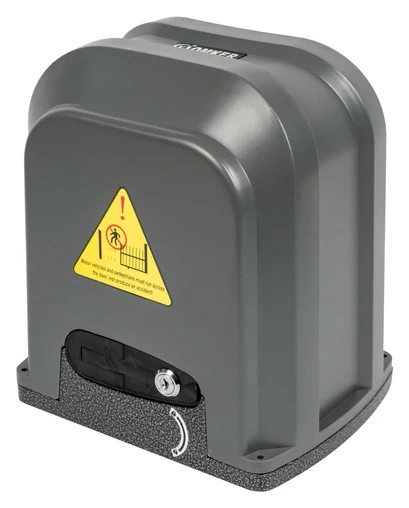 Sliding gate motor housing with warning label and override key